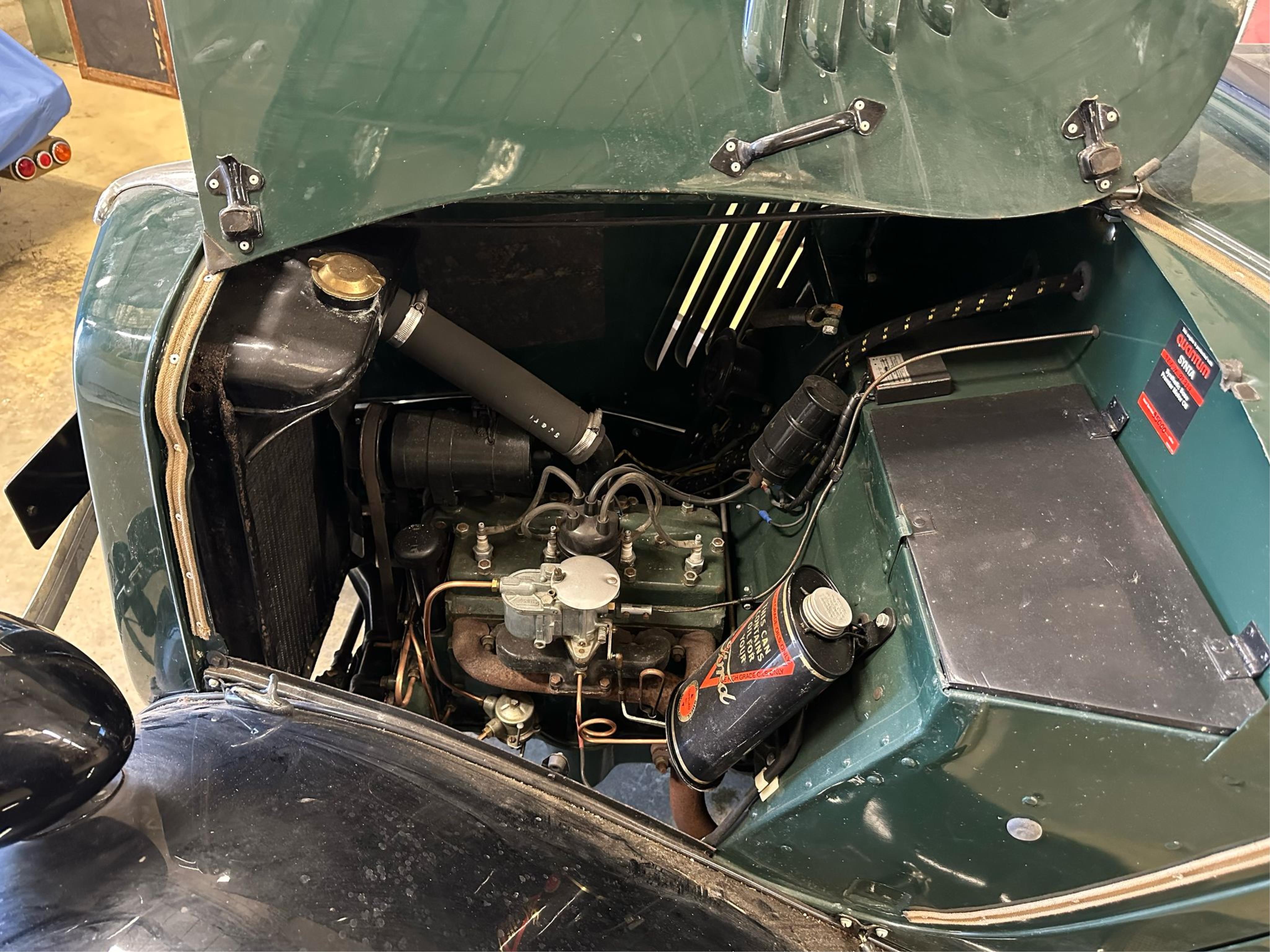 A 1936 Ford Model Y saloon, reg. no. CYM868, 885cc, dark green, odometer showing 93,057 miles. Restored by the late owner, to a very high standard and winner of seven Concours d’Elegance awards